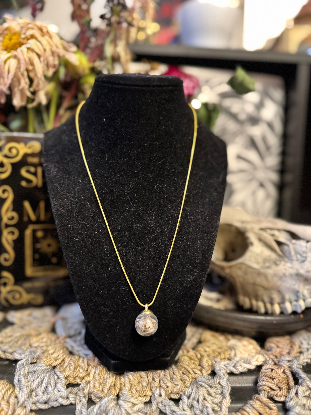 Mouse Bone Globe Necklace on Gold Chain