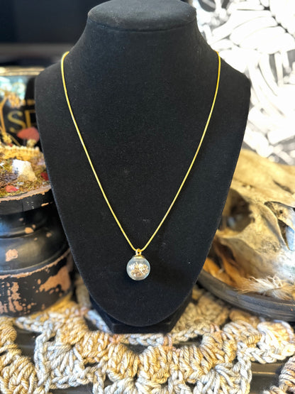 Mouse Bone Globe Necklace on Gold Chain