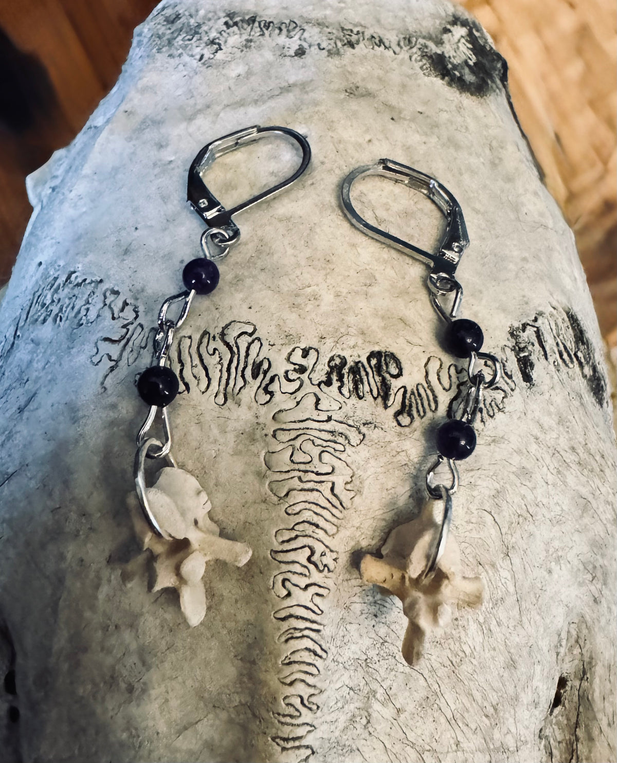 Raccoon Vertebrae Earrings in Silver with Purple Beads
